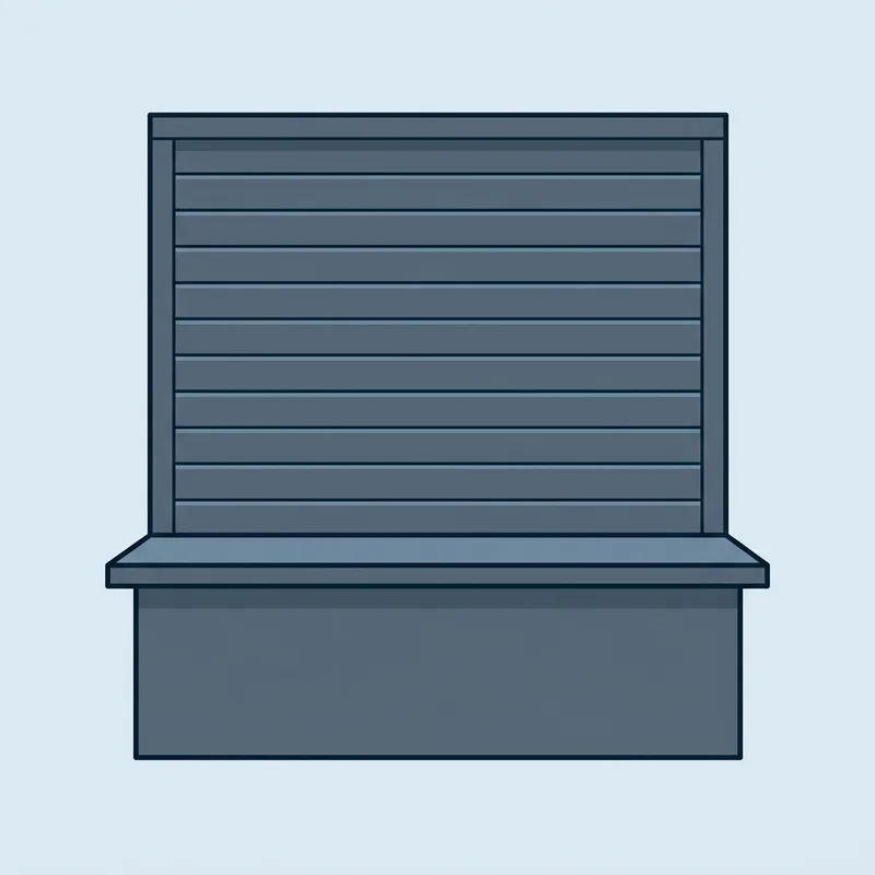 An empty service counter with a closed shutter, seen straight on