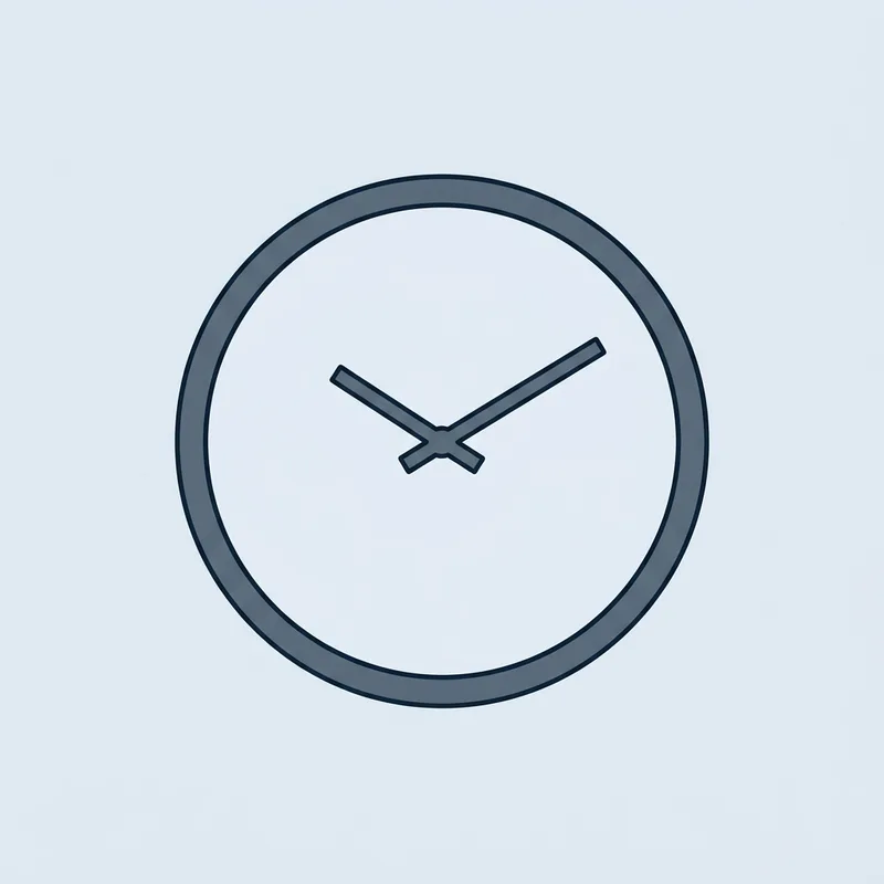 A plain round wall clock mounted on an empty wall, seen straight on